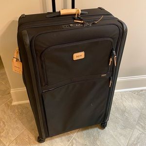 Tumi Worldwide Trip Expandable 4 Wheel PackingCase